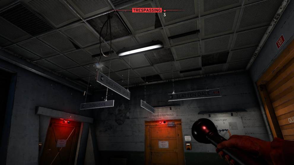 looking at direction panels with flashlight